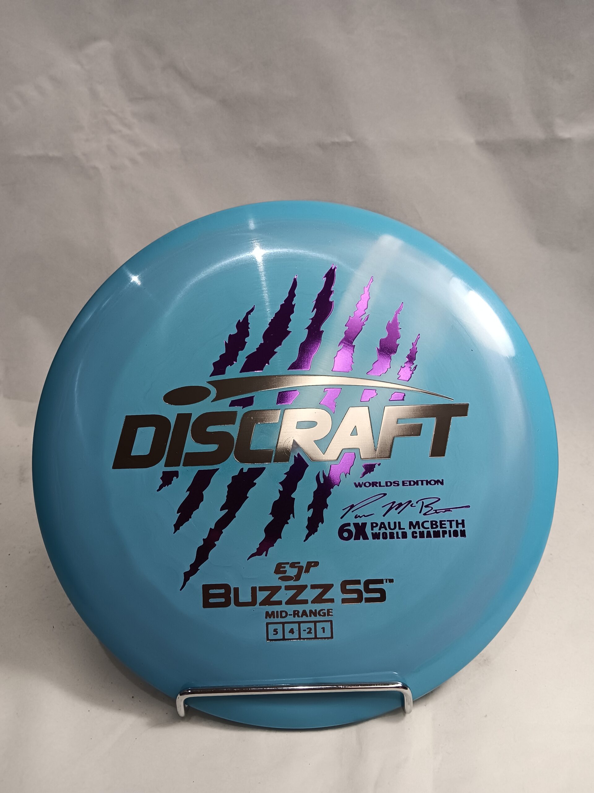 Discraft Buzzz SS - Worlds Edition Paul McBeth 6-Claw ESP 173-174g (Blue/Purple With Silver/Purple Foil)